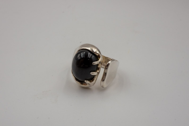 Ring with black stone: T. Norlander
