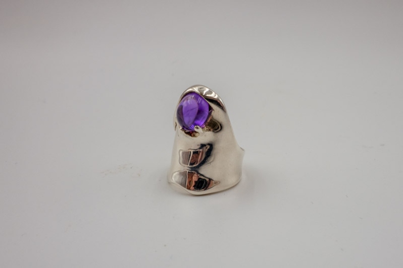 Ring with purple stone: T. Norlander